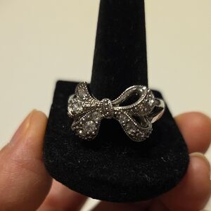 Avon Elegant Silvertone Crystal Bow Ring Size 10.25
